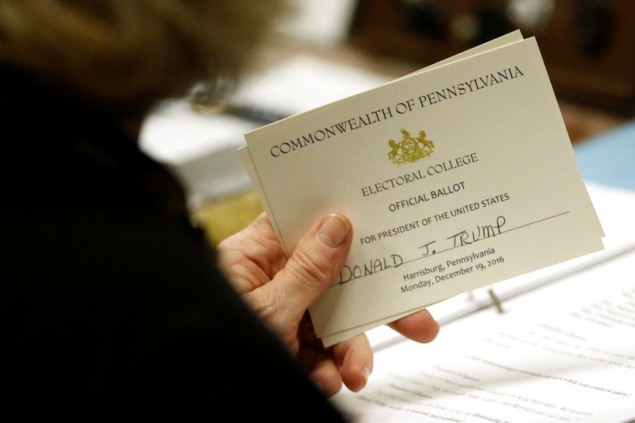 Pennsylvania elector Carolyn Bunny Welsh with her ballot for Trump before casting it at the Pennsylvania State Capitol in Harrisburg on Monday.