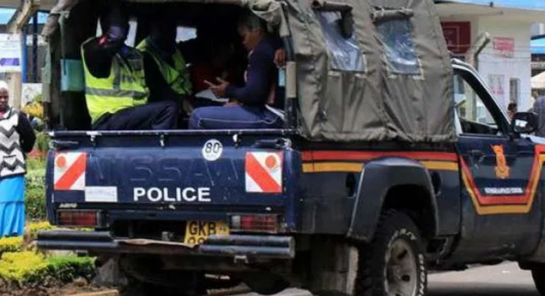 File image of a police vehicle ferrying suspects