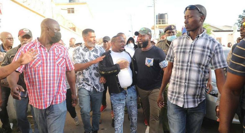 Mike Sonko being whisked away after confrontation with Hassan Joho 