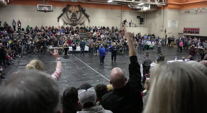 Hundreds of East Palestine residents attended the town hall meeting at a local gym.Gene J. Puskar/AP