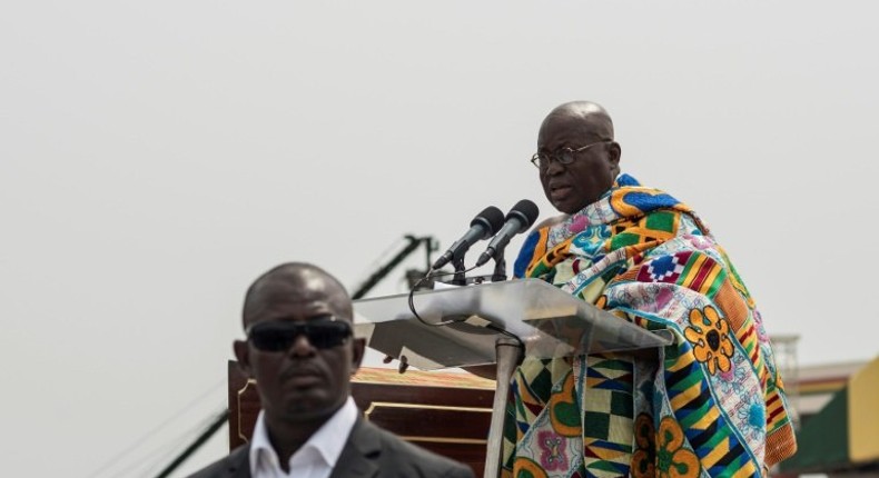 The winner of Ghana's presidential election, Nana Akufo-Addo, takes the oath of office during the swearing-in ceremony at Independence Square in Accra, on January 7, 2017