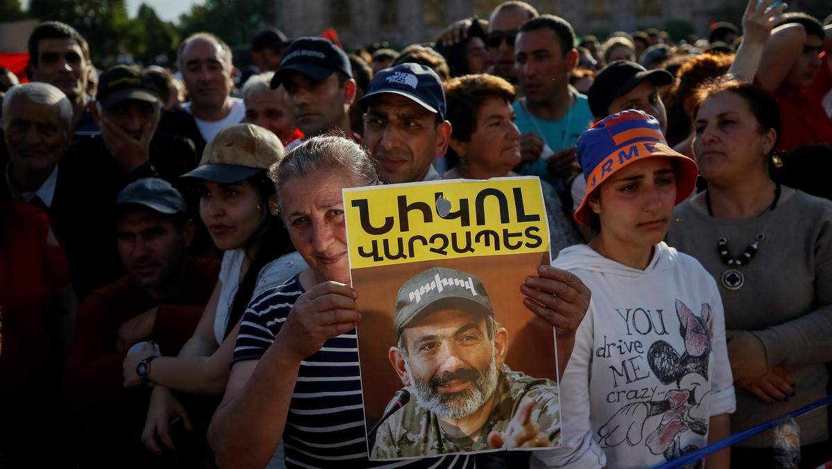 Armenian opposition supporters attend a rally after protest movement leader Nikol Pashinyan announce