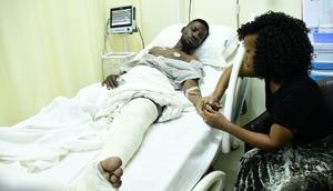 Barbie Itungo Kyagulanyi and her husband in hospital