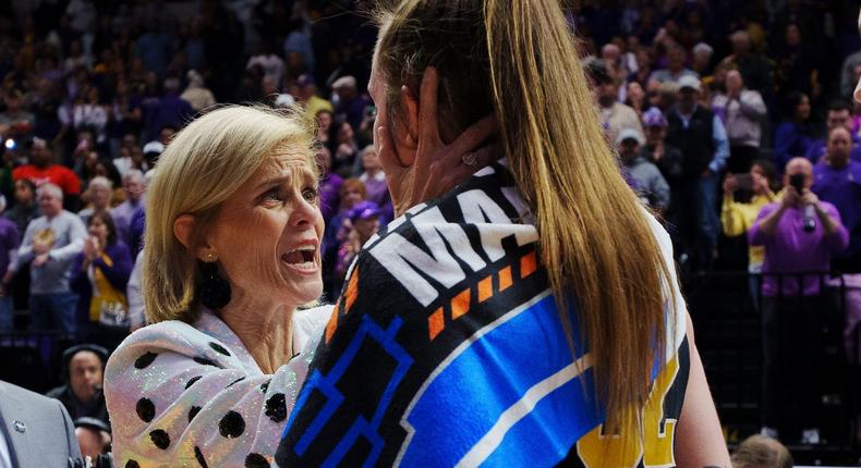 LSU head coach Kim Mulkey (left) comforts Michigan's Leigha Brown after their March Madness matchup.Rebecca Warren/NCAA Photos via Getty Images