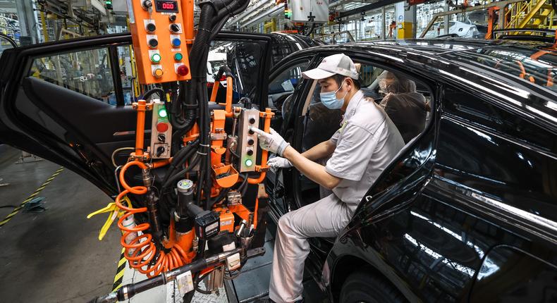 Output at China's factories slowed unexpectedly in July.Visual China Group/Getty Images