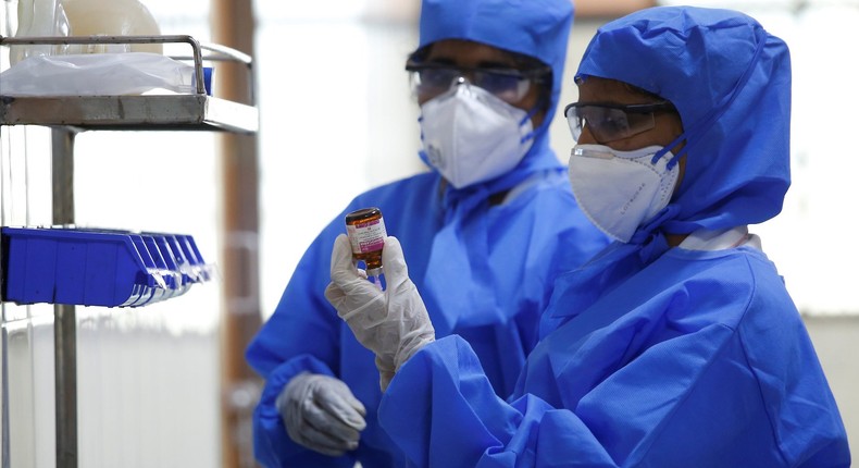 A file photo of scientists in China working on containing coronavirus