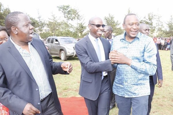 Walte Mong'are with President Uhuru Kenyatta and CS Fred Matiang'i during a past event in Kisii County 