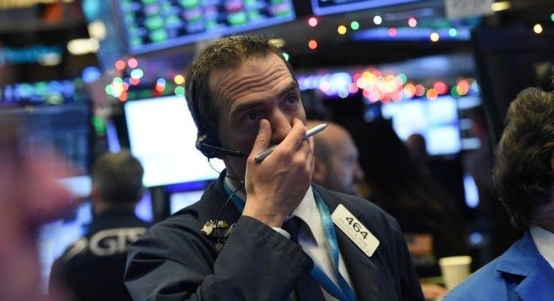 A trader looks on while waiting for the initial price of Tencent Music Entertainment company's IPO on the floor of the New York Stock Exchange (NYSE) in New YorkThomson Reuters