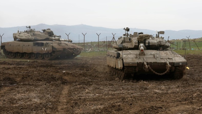 Israeli tanks deploy in the Israeli-annexed Golan Heights on January 20, 2019