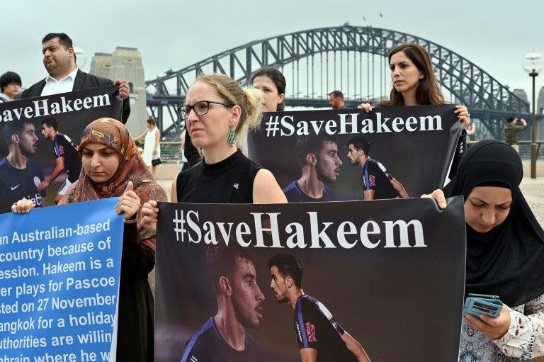 Human rights groups and the Australian football community hold a protest in front of the Sydney Opera House for the release of refugee footballer Hakeem Alaraibi