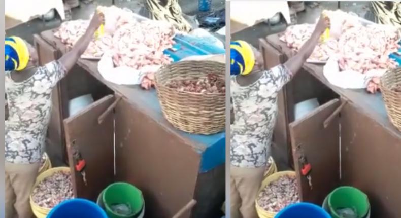 Health alert: Ghanaian meat seller caught spraying the meat with mosquito spray (video)