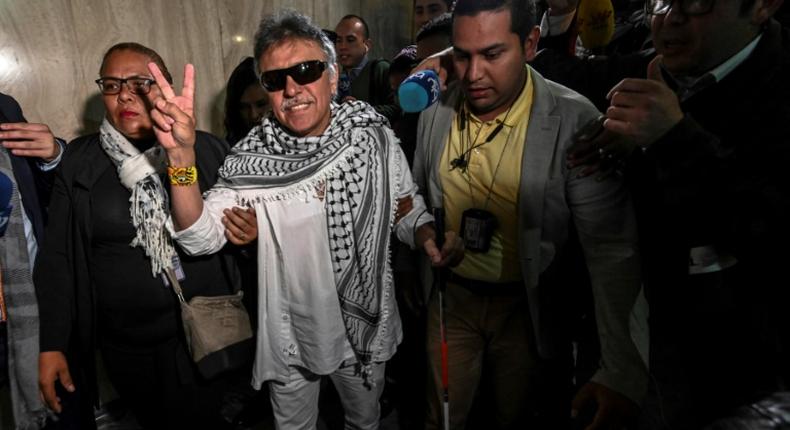 Former FARC guerrilla leader Jesus Santrich (C), was sworn in as a Colombian senator June 11, 2019 but has since disappeared after failing to appear in court to face a US extradition request over drug trafficking charges