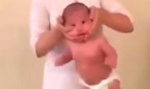 Przerażający „masaż”. Trzyma niemowlaka za szyję i nim macha
