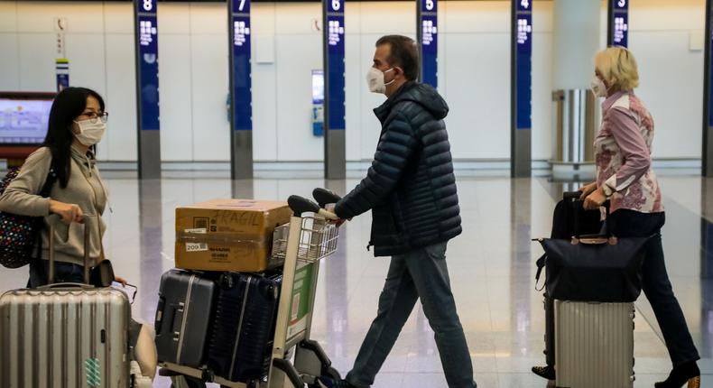 Coronavirus airport virus mask China Hong Kong