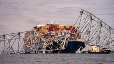 Divers find bodies of 2 people who drowned after Baltimore bridge collapsed  [Yahoo News]