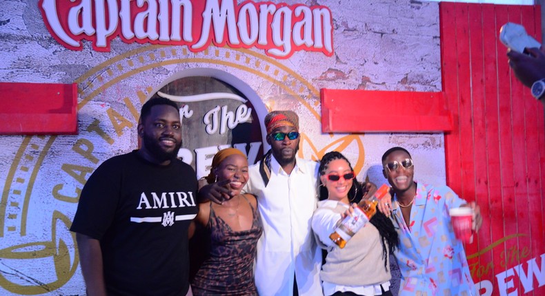 Kranium poses with fans upon arrival in Kampala