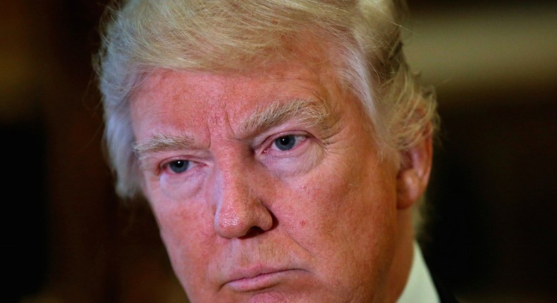 U.S. President-elect Donald Trump listens to questions from reporters while appearing with Alibaba Executive Chairman Jack Ma after their meeting at Trump Tower in New York, U.S., January 9, 2017.