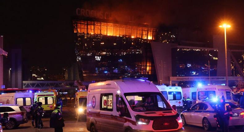 A fire rages inside the Crocus City Hall in Krasnoyarsk, Russia, near Moscow. Russia's state media agency reported that armed gunmen opened fire at the music venue.Contributor/Getty Images