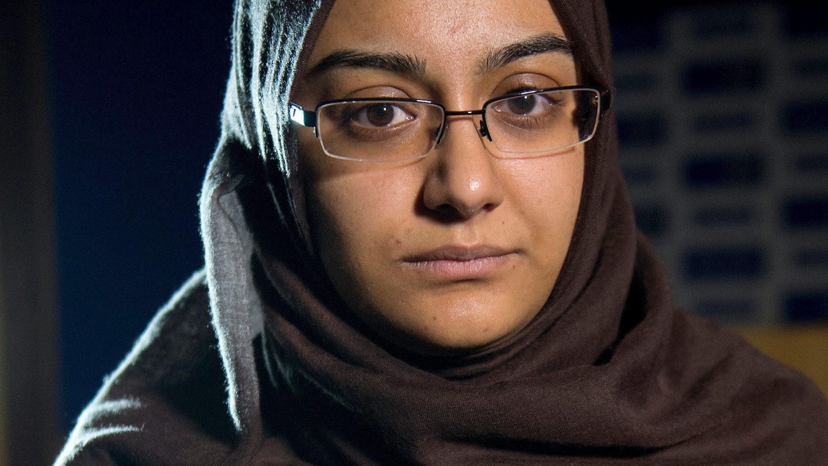 FILE PHOTO: Renu Begum, sister of teenage British girl Shamima Begum, holds a photo of her sister as