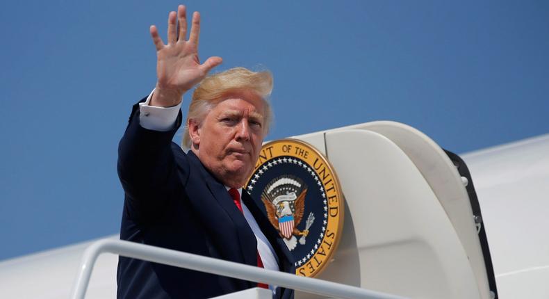 President Donald Trump boards Air Force One for travel to New Jersey from Joint Base Andrews in Maryland, August 4, 2017.