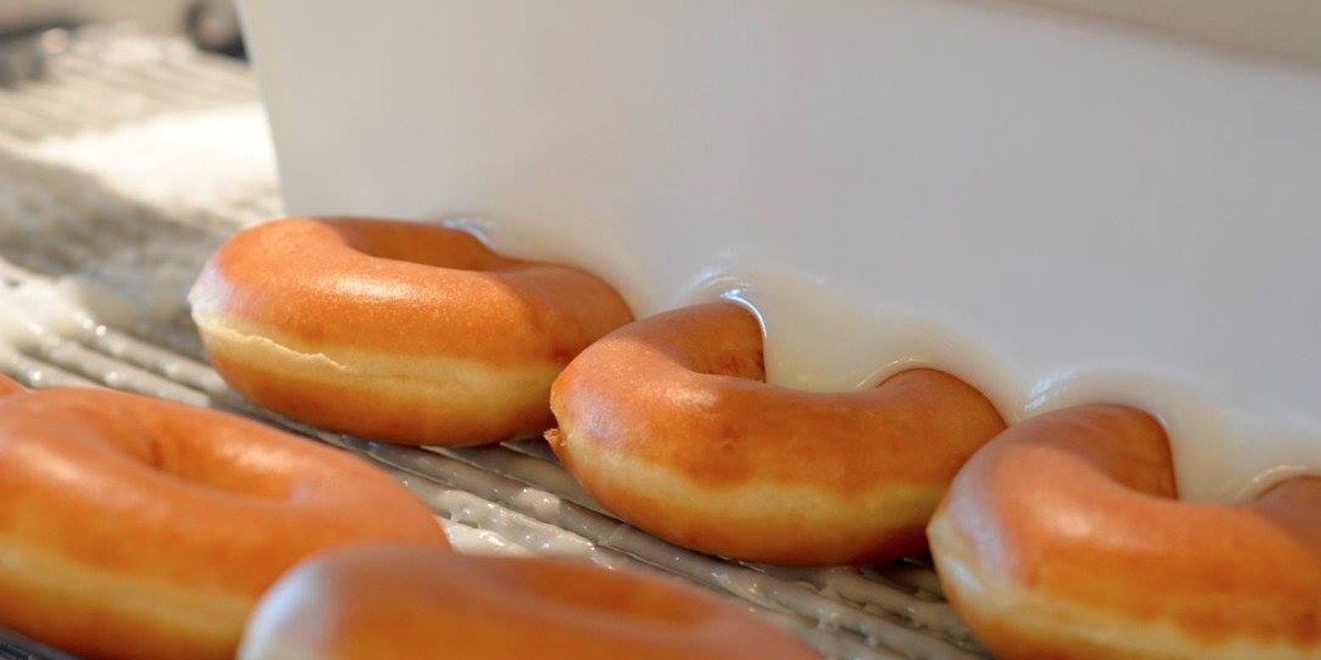 Doughnuts being glazed at Krispy Kreme's Clemmons, North Carolina location