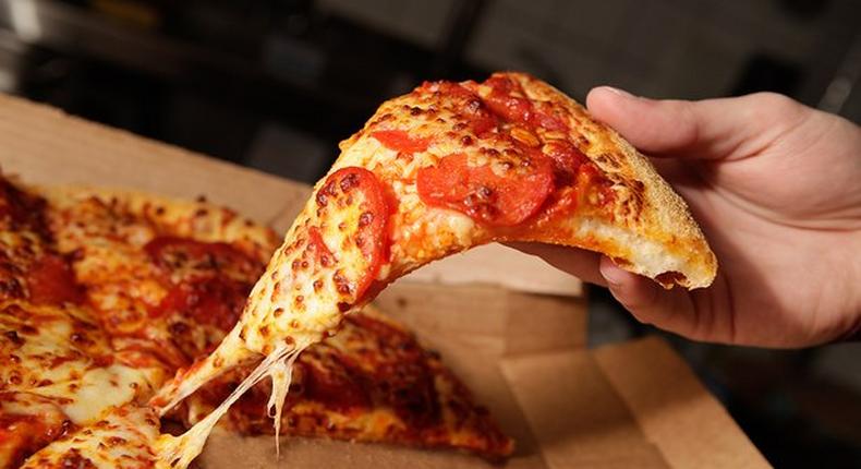 Man orders pizza but he was stunned when he opened the box to find $1300 (N270,000)