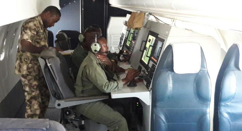 Nigeria Air force officers in a war plane, launching assault on Boko Haram