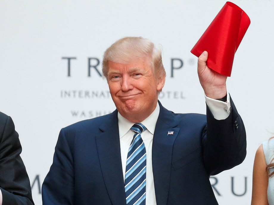Donald Trump cuts the ribbon at his new Trump International hotel in Washington, DC, U.S., October 26 2016.