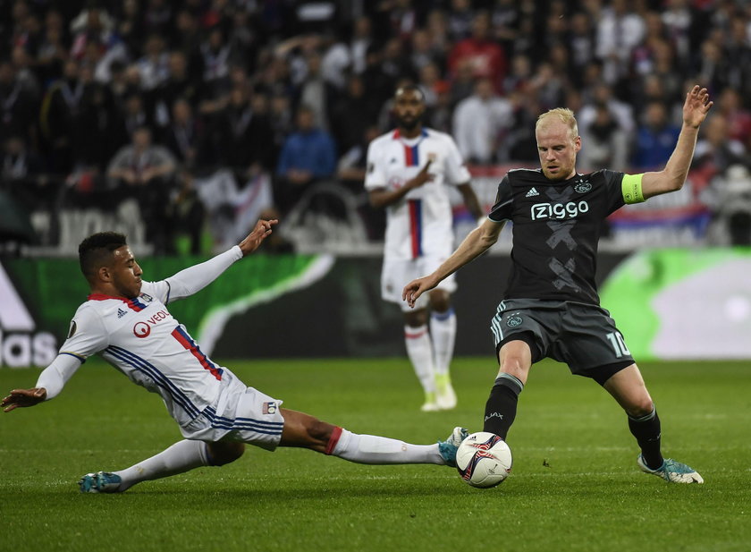 Ajax's Amin Younes in action with Lyon's Anthony Lopes