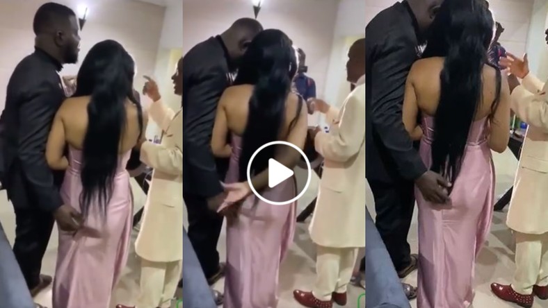 Groom captured in a video grabbing and playing with bride’s ass while pastor prays for them