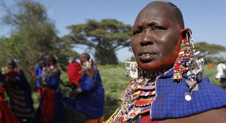 A Maasai woman, at the base of Mt. Kilimanjaro near the Kenya-Tanzania border in Kajiado December 13, 2014. REUTERS/Thomas Mukoya