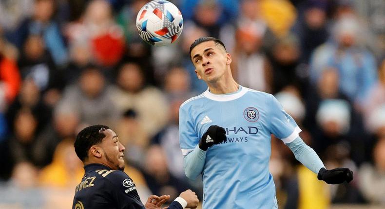 New York City FC's Jesus Medina, right, goes for a header against Philadelphia's Jose Andres Martinez in City's 2-1 victory over the Union to advance New York to the MLS Cup final Creator: Tim Nwachukwu