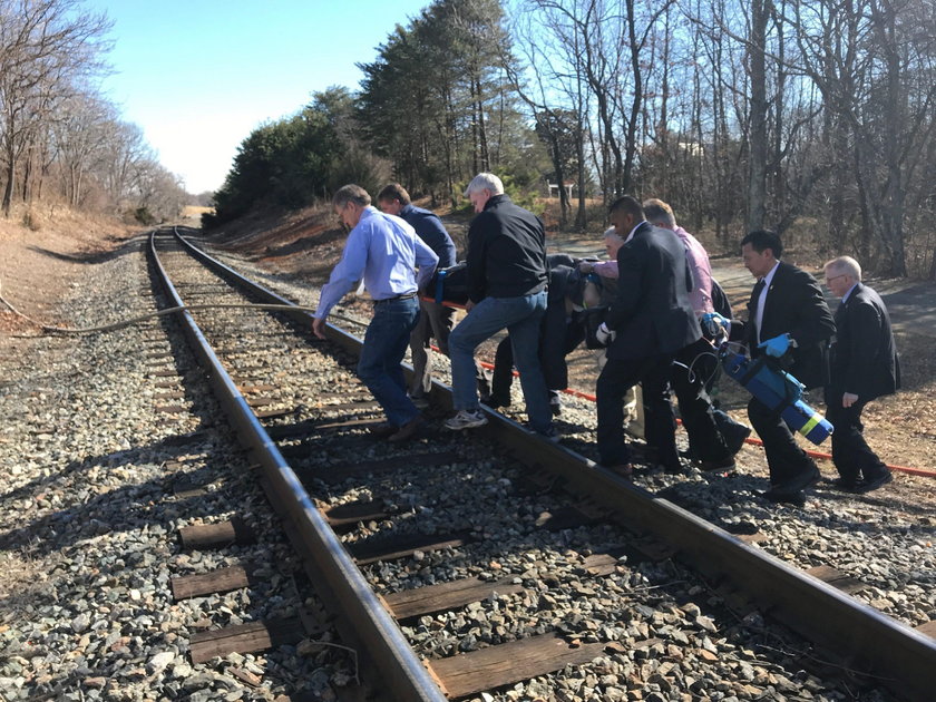 View of the scene following the accident when a train traveling from Washington to West Virginia car