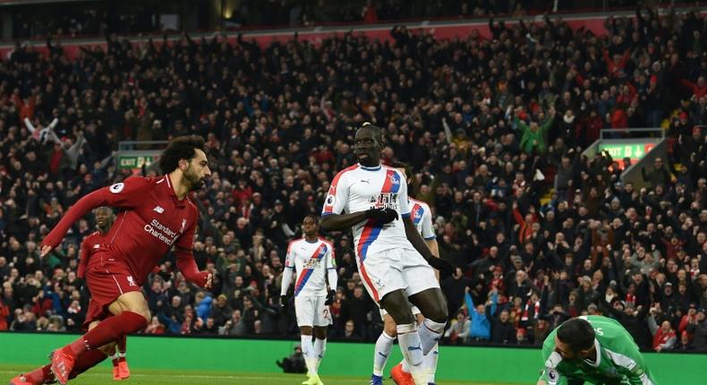 Mohamed Salah celebrates after scoring his first goal