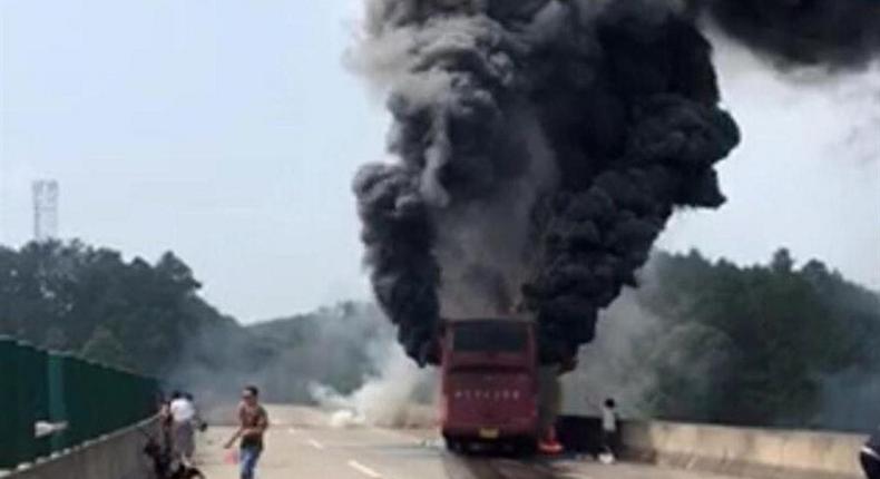 Photo provided by witness on June 26, 2016 shows the accident site of a bus fire in Yizhang County, central China's Hunan Province.