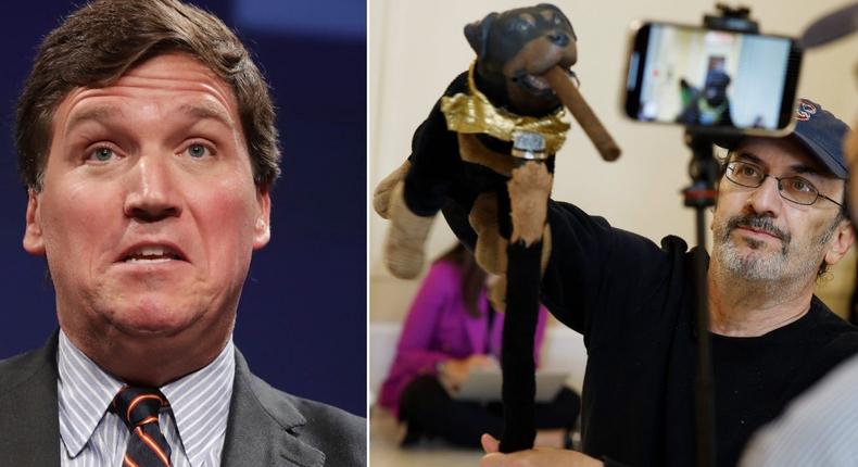 Tucker Carlson, left, and Robert Smigel, right, performing as Triumph the Insult Comic Dog in the hallways of the US Capitol on June 16, 2022.