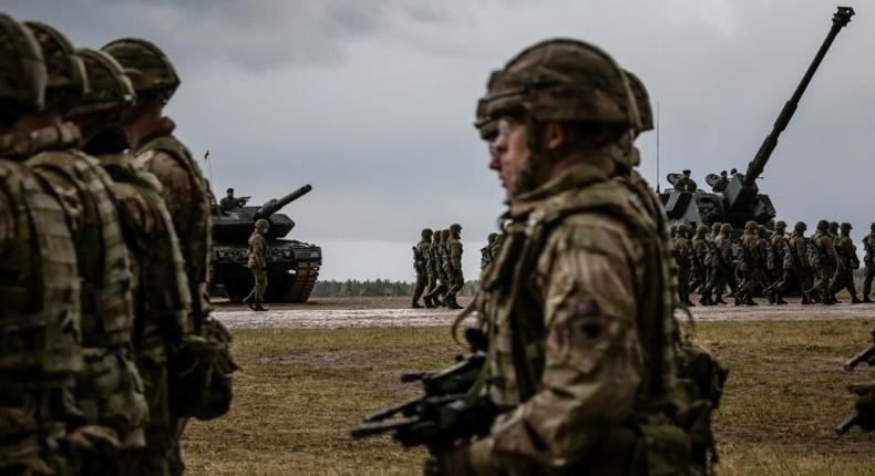 US and Polish troops take part in the official welcoming ceremony for NATO troops - part of The Enhanced Forward Presence, in Orzysz, Poland April 13, 2017