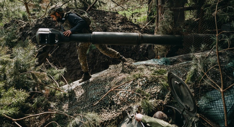 Soldiers from the Ukrainian 63rd Brigade are hiding artillery unit 2S3 Akatsiya, a Russian-made self-propelled howitzer of 152 caliber, on the firing positions as Russia-Ukraine war continues in Lyman, Donetsk Oblast, Ukraine on April 13, 2024.Wojciech Grzedzinski/Anadolu via Getty Images