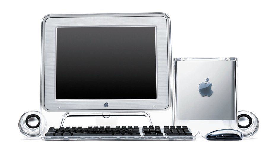 The Power Mac G4 Cube, plus the monitor, keyboard, mouse, and iconic Harman Kardon-made speakers.