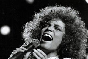 Singer Whitney Houston performing in 1986