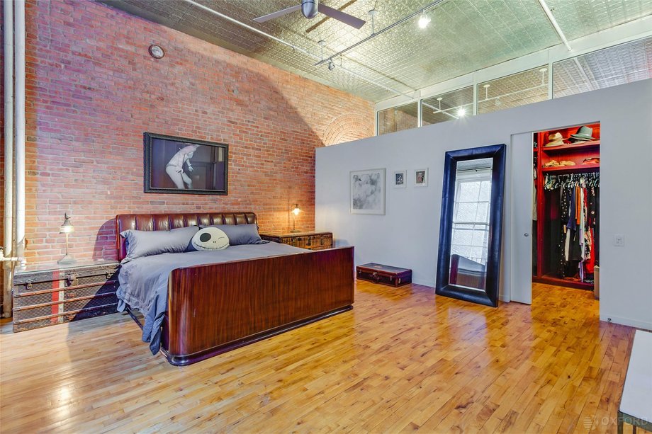 The spacious master bedroom has a walk-in closet, too.