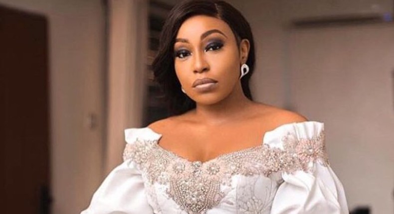 Rita Dominic looks sensational in white for Lala Akindoju and Chef Fregz nuptials