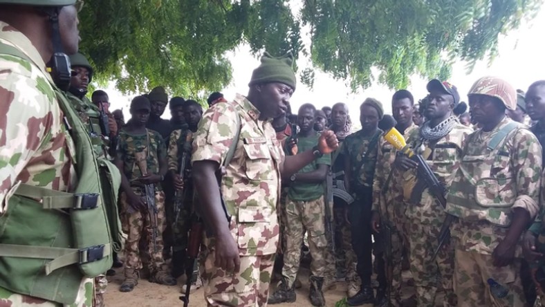 Maj.-Gen. Olusegun Adeniyi, the Theater Commander, Operation Lafiya Dole, addresses troops of the 5 Battalion, Gubio in Borno on Sunday [NAN]