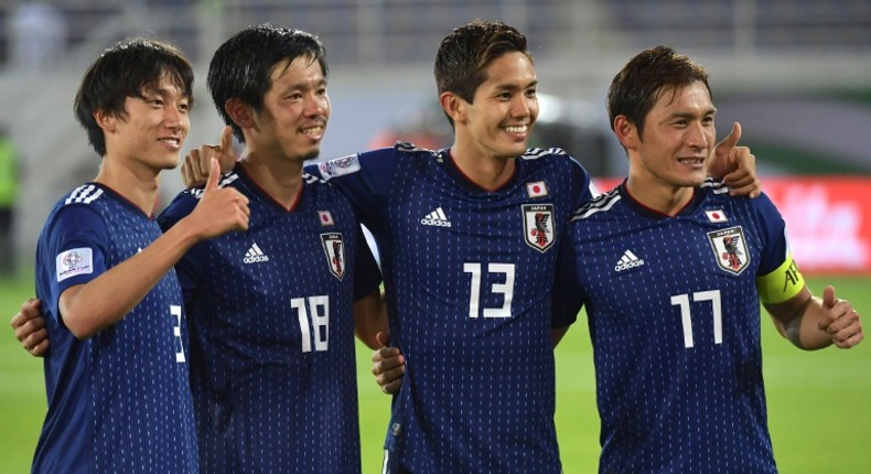 Shiotani (second left) scored as Japan saw off Uzbekistan 2-1