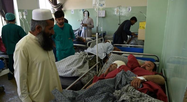 Afghans wounded in a truck bombing receive treatment at a hospital in Kabul. The bomb, hidden in a sewage tanker, killed at least 90 people and wounded hundreds