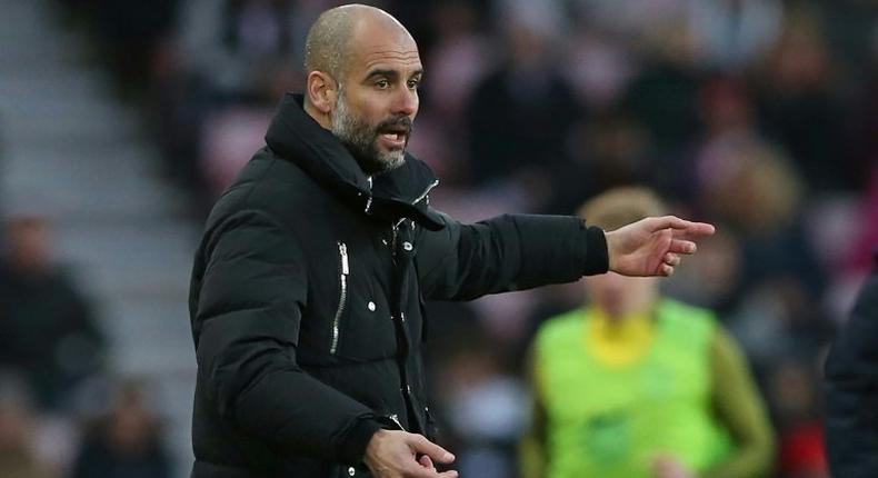 Manchester City's Pep Guardiola shouts instructions during a Premier League match against Sunderland at the Stadium of Light in north-east England, on March 5, 2017