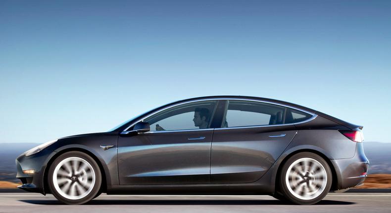 Tesla will offer a premium version of the Model 3 that can drive 310 miles on a single charge.