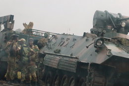 Tanks in the streets and long lines to withdraw money — here's what Zimbabwe looks like under military control