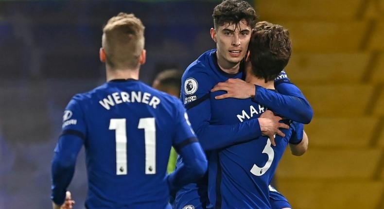 Chelsea midfielder Kai Havertz (C) celebrates against Everton