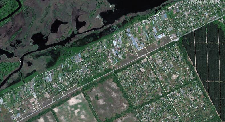 Satellite imagery of flooded homes in Korsunka, Ukraine, on May 15, 2023.Satellite image (c) 2023 Maxar Technologies via Getty Images